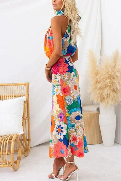Sommer | Ärmelloses Maxikleid mit Halsband, taillierter Schnitt und floralem Muster