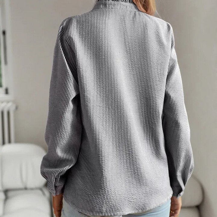 Camila | Elegante Bluse" can be rewritten as "Camila | Stylish Elegance Blouse.