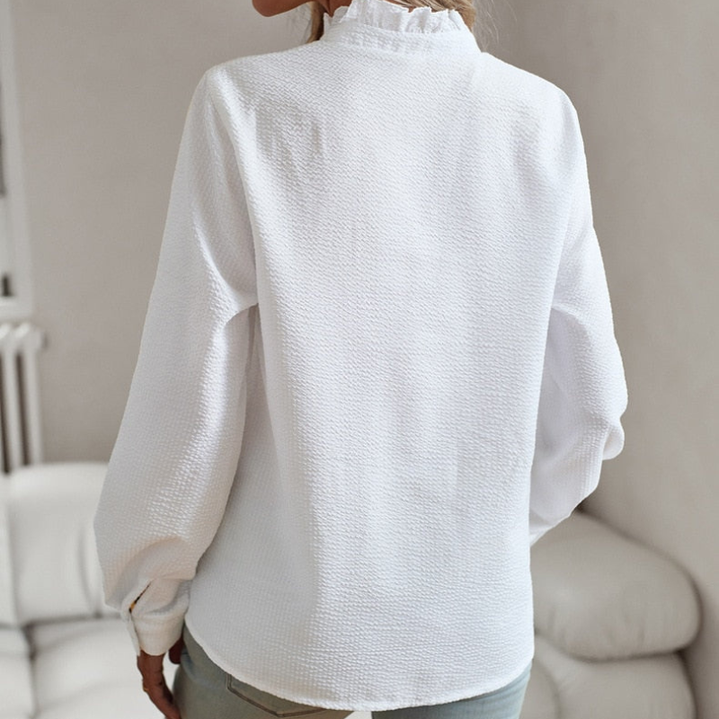 Camila | Elegante Bluse" can be rewritten as "Camila | Stylish Elegance Blouse.