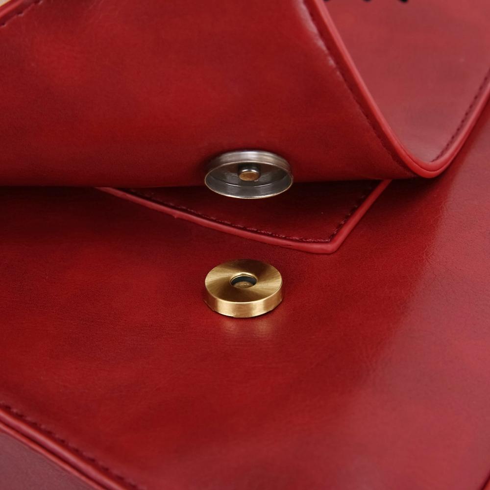 Monikas stilvolle Schleifenhandtasche