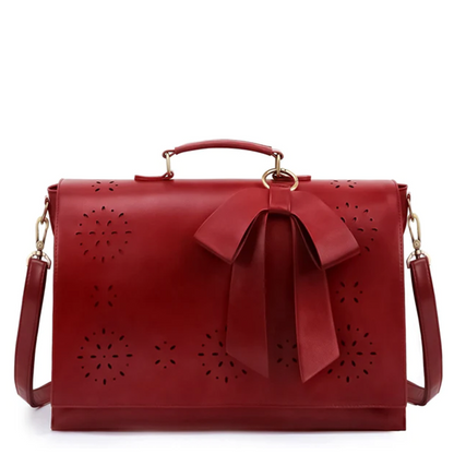 Monikas stilvolle Schleifenhandtasche