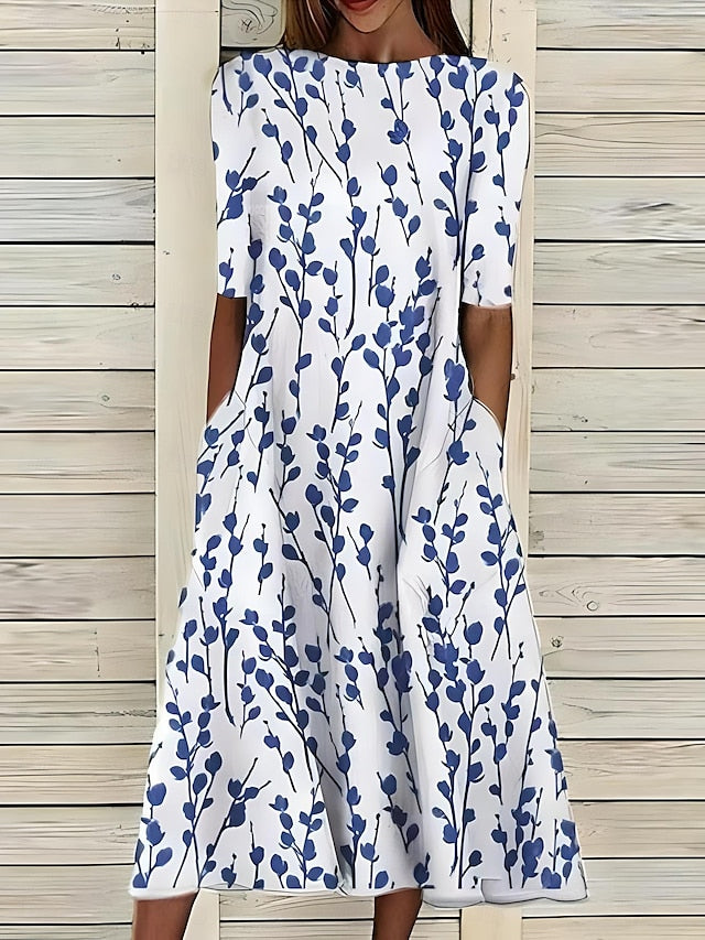 Sela™ – Elegantes Midikleid mit floralem Sommerdesign
