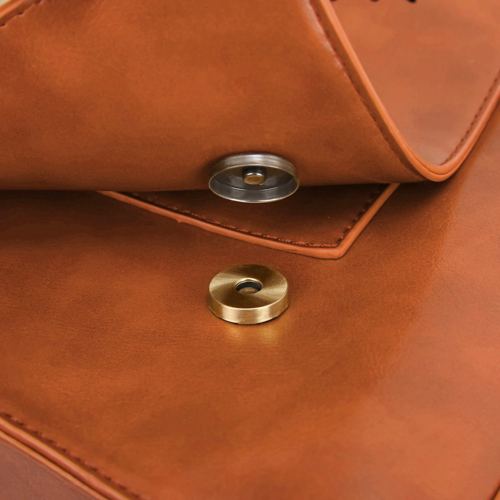 Monikas stilvolle Schleifenhandtasche