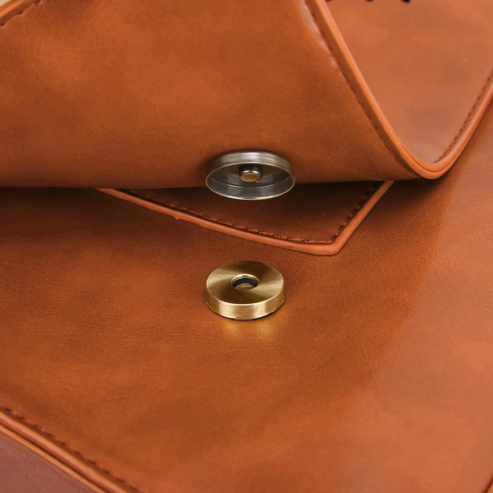 Monikas stilvolle Schleifenhandtasche