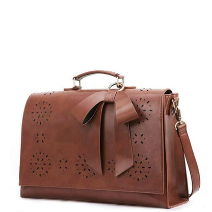 Monikas stilvolle Schleifenhandtasche
