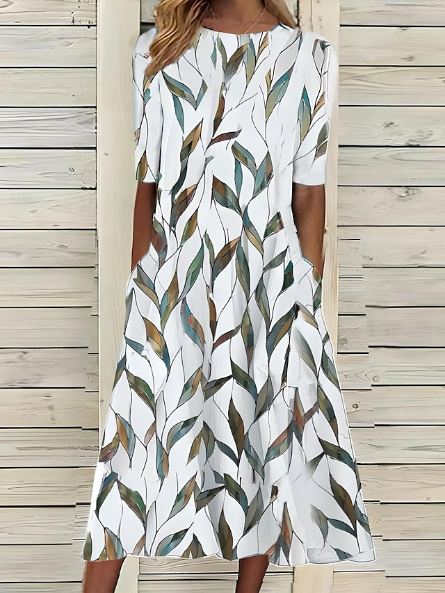 Sela™ – Elegantes Midikleid mit floralem Sommerdesign