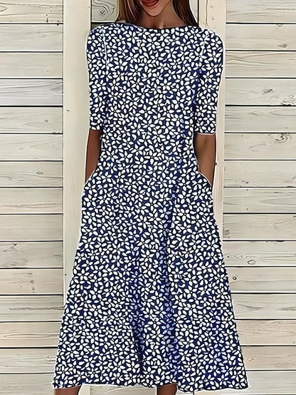 Sela™ – Elegantes Midikleid mit floralem Sommerdesign
